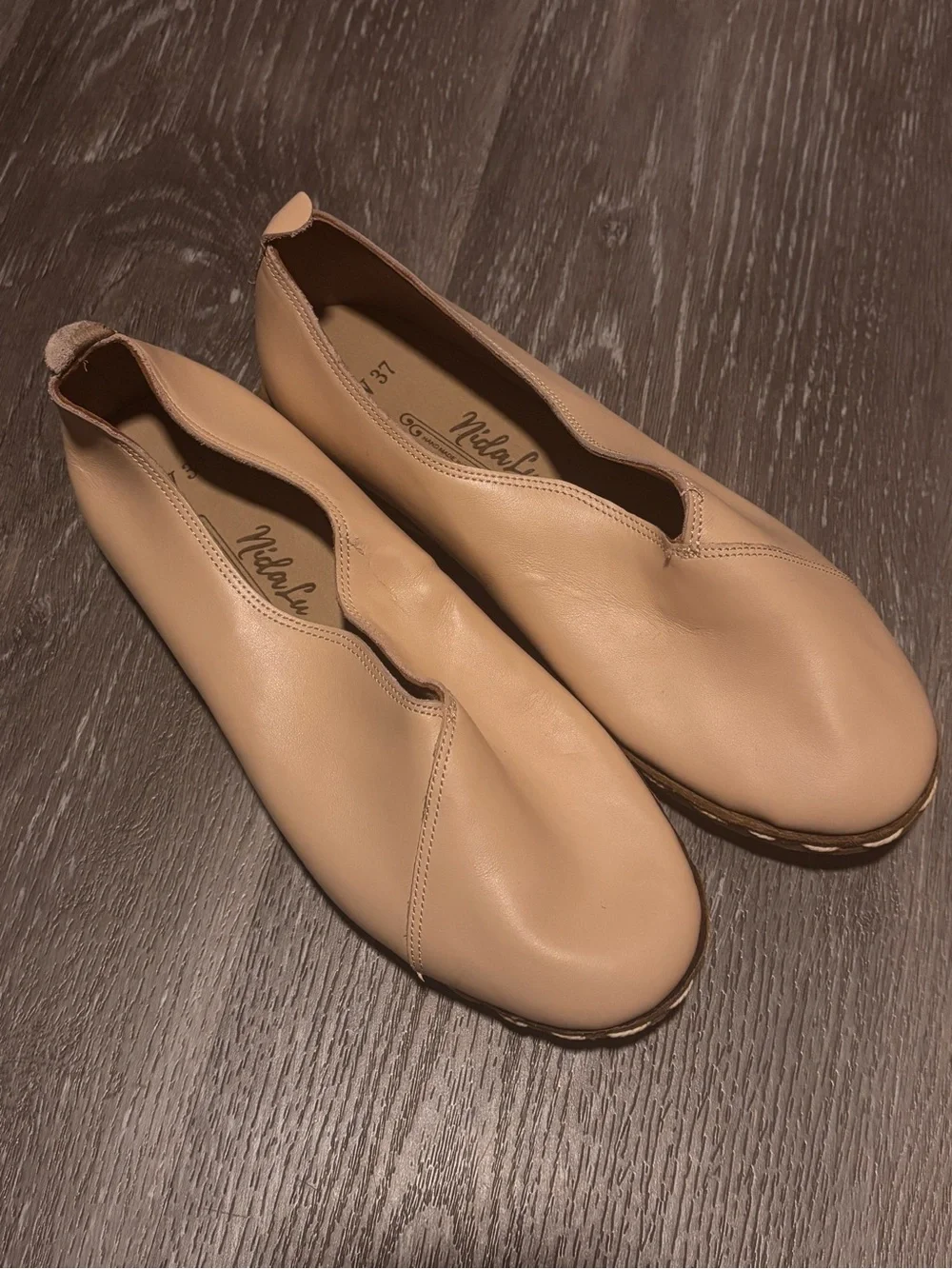 Nida Lu handcrafted leather flats in nude size 6-6.5 has some flaws